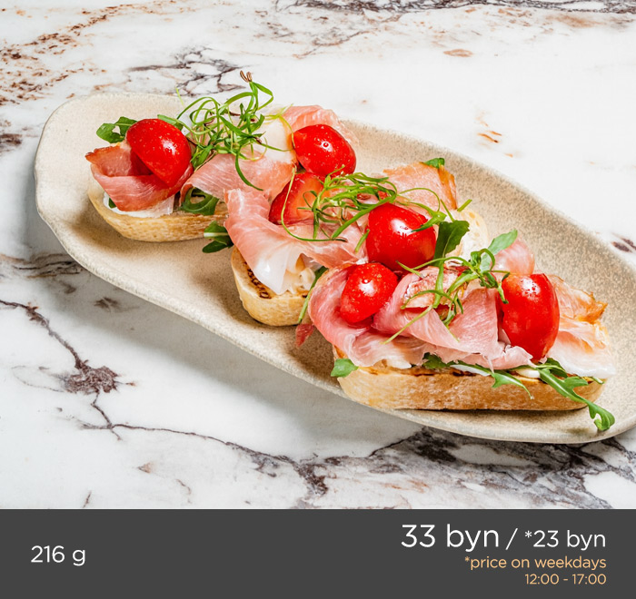 BRUSCHETTA WITH PARMA HAM AND AND CHERRY TOMATOES